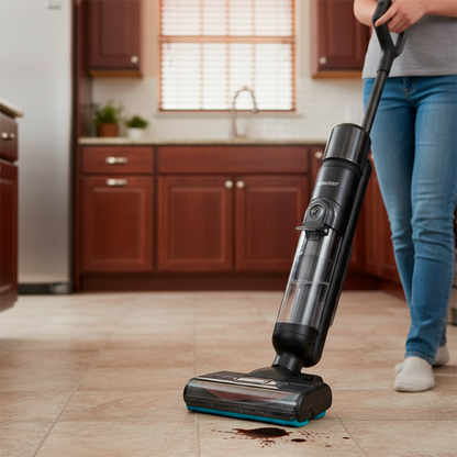 balai aspirateur laveur qui ramasse le café versé sur le sol