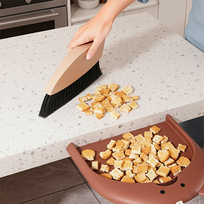 balayette qui ramasse les miettes de pains