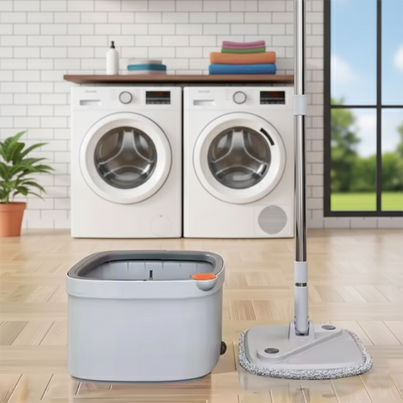 Kit seau et serpillère ultra-performant posé devant un lave-linge dans une buanderie